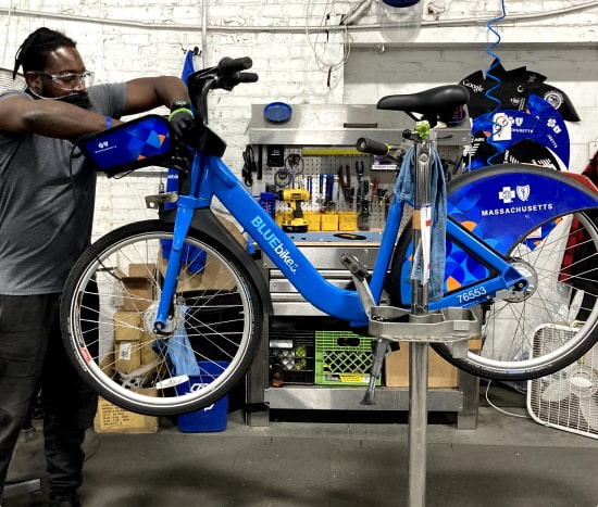 Bike mechanic working on bike