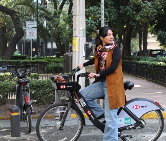 Woman riding bike in CDMX